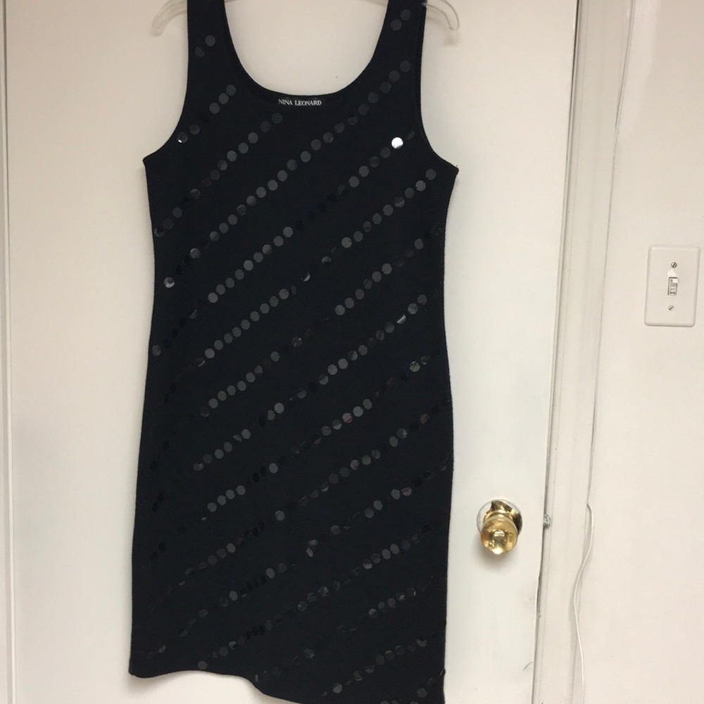 Black sleeveless sweater dress with sequins